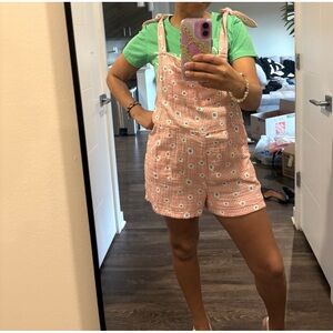 SO Peach Gingham romper with floral details